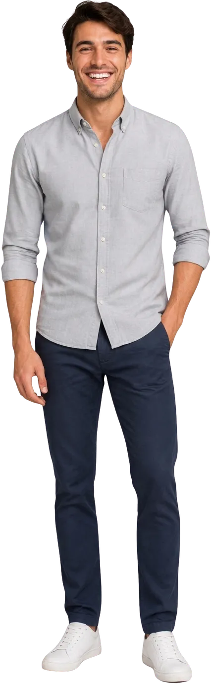 A young man smiling confidently