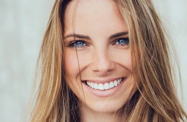 Healthy smile after dental treatment at West House Dental, Pinner